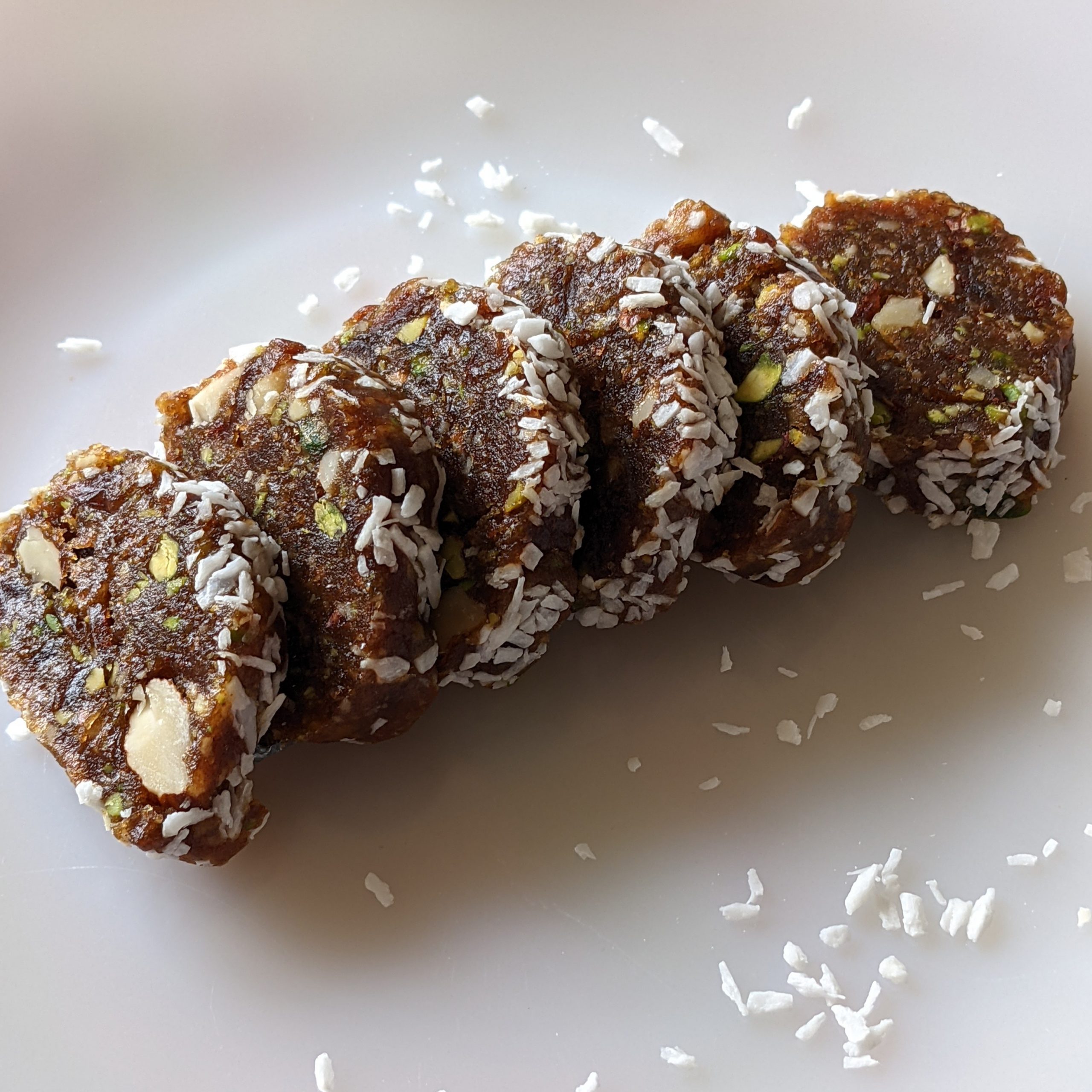 easy-date-log-roll-almond-pistachio-walnut-coconut-roll-recipe