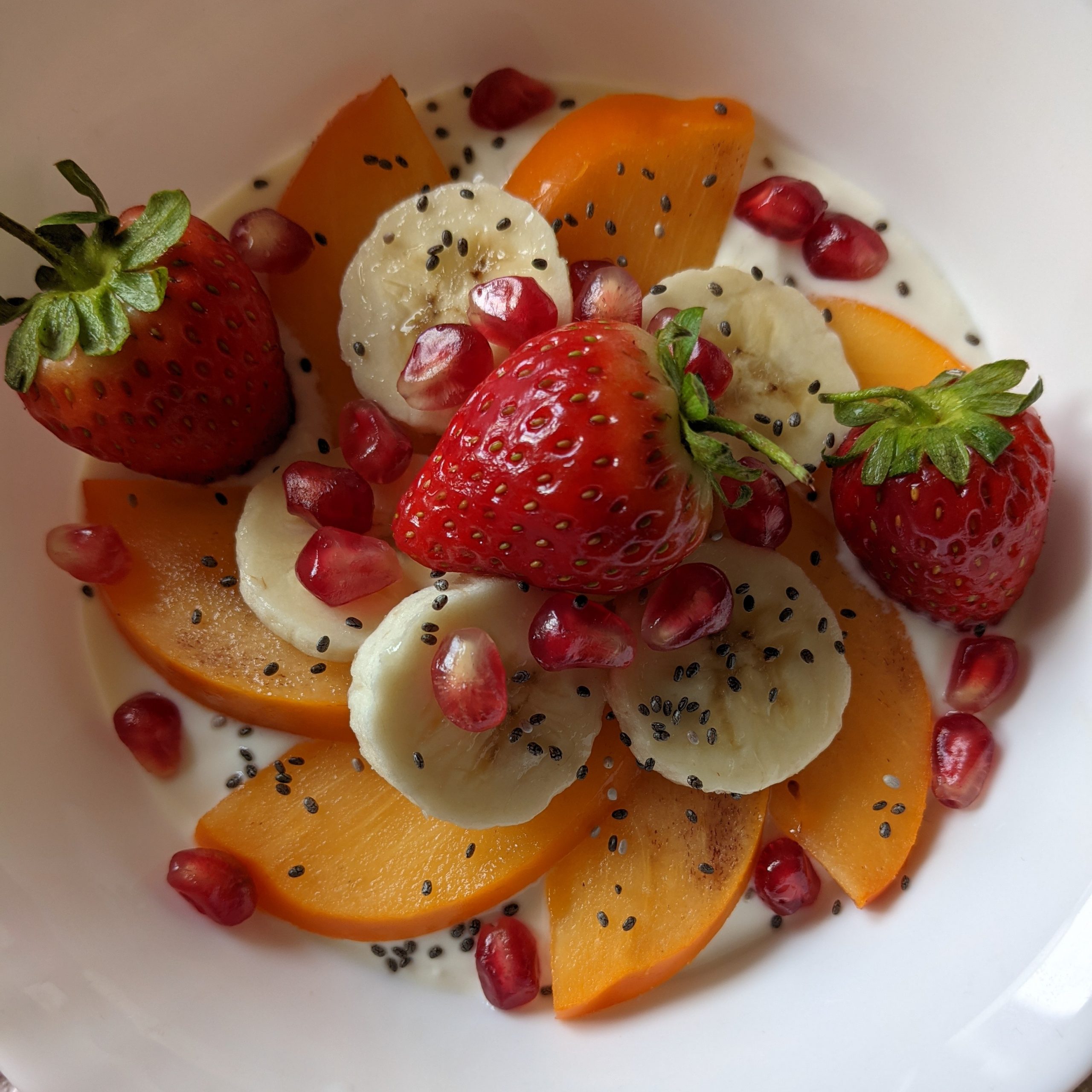 Breakfast-Yoghurt-Bowl-Recipe-with-Persimmon-Strawberries-Banana-Pomegranate-Arils-Chia-Seeds-Vanilla-Yoghurt-Recipe