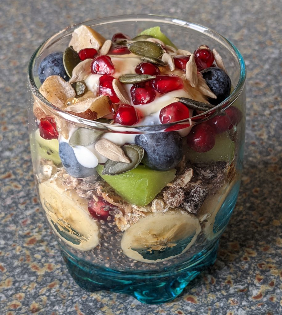 healthy-chia-pudding-with-granola-muesli-banana-kiwi-fruit-yoghurt-blueberries-sunflower-seeds-pumpkin-seeds-healthy-dessert-healthy-breakfast