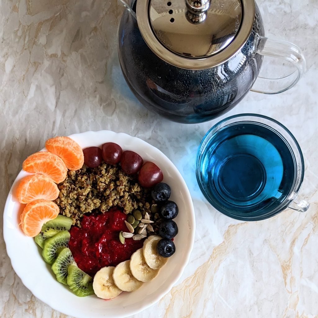 ginger-powder-beetroot-porridge-with-moringa-quinoa-and-fruits-sunflower-seeds-pumpkin-seeds-healthy-breakfast-recipes-rainbow-breakfast-bowl-blue-pea-flower-tea
