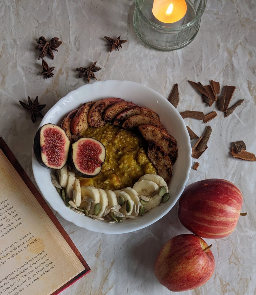 golden-oatmeal-apple-spiced-breakfast-bowl-with-turmeric-ashwagandha-and-spices-autumn-breakfast-recipes
