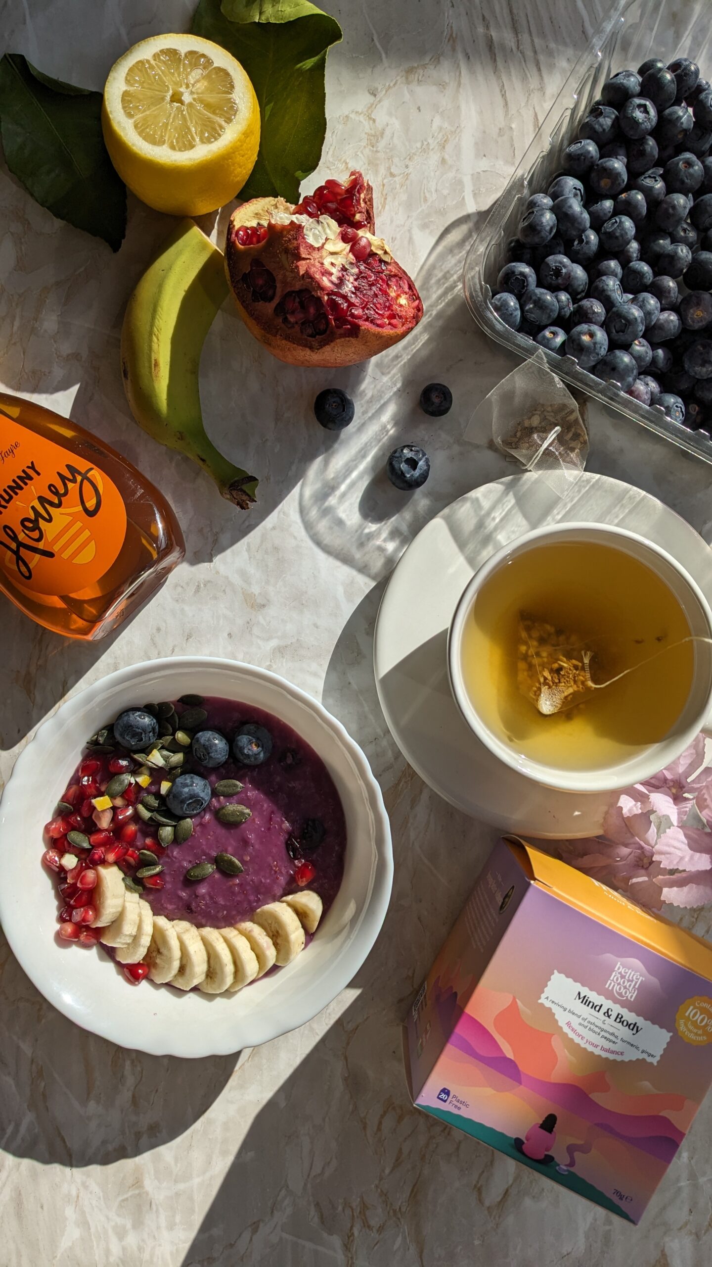 lemon and blueberry oatmeal breakfast with turmeric ashwagandha tea